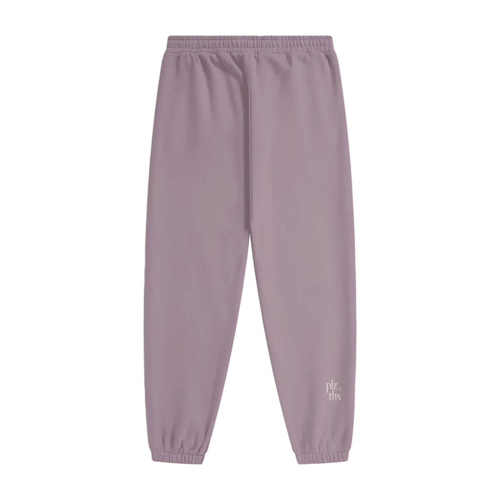 Purple sweatpants with a brand logo on a white background