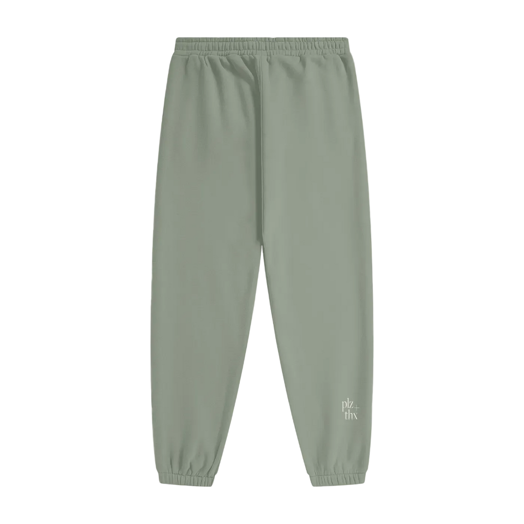 Green sweatpants with a brand logo on a white background